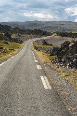 A road through rugged landscape, Norwegian Scenic Route Varanger, B&aring;tsfjord, Norway
