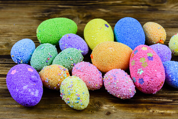 Easter eggs made of styrofoam on a wooden background