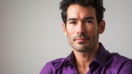 Obraz premium Portrait of confident businessman. Handsome mid adult male is wearing purple shirt. 