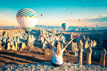 Beautiful spectable of hot air balloons flying in the air over Cappadocia- Travel destination,...