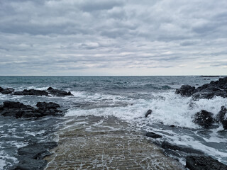 
This is the Jeju Island beach with rough waves.