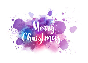 Merry Christmas - handwritten modern calligraphy lettering text on multicolored watercolor paint splash. Holiday illustration.