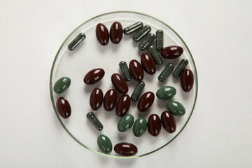 Petri dish with pills.