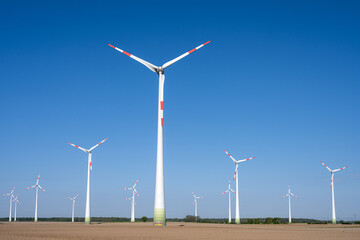 Wind energy turbines in barren fields seen in Germany