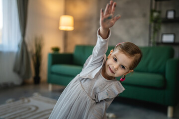 portrait of small caucasian girl two years old toddler at home