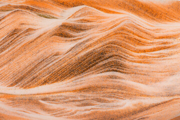 Abstract  dust of pigment sparkling with yellow fluid color，Abstract desert background