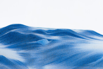 Closeup dust of pigment sparkling with blue fluid color，Abstract mountain background