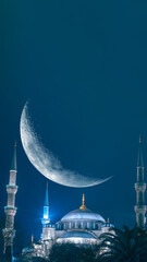 The Blue Mosque or Sultanahmet Camii with crescent moon. Ramadan concept image.