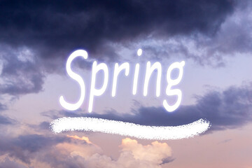 Blue sky with clouds and words, spring springtime. Spring background