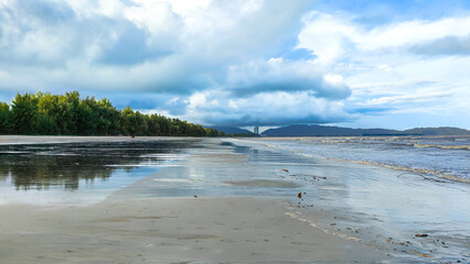 This is sunset at the beach in Pantai Anak Air Kuantan Pahang. This beautiful view was captured in the evening during cloudy day and a building in the vanishing point.
