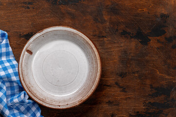 Mockup for a delicious meal. Empty plate on a table