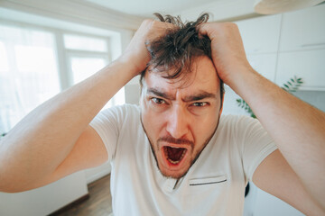 Tousled haired subject energetically declares their craziness and nervousness