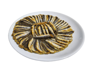 Anchovy fish fried with cornmeal on plate