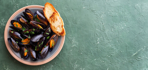 Cooked mussels with oil and parsley. Sea food. Healthy eating. Diet.