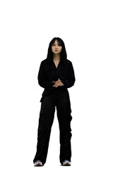 A woman in black clothes, on a white background, in full height, screams
