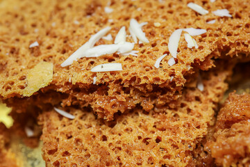 ghewar traditional indian delicious sweet close up shot in details from different perceptive