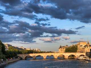 sunset view of bridge on Seine river in Paris