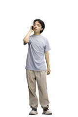 A guy in a gray T-shirt, on a white background, full-length, talking on the phone