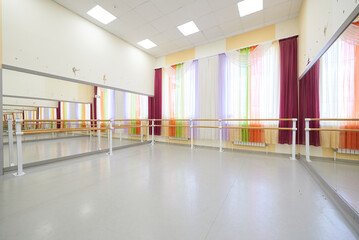 Choreography room with ballet barre and mirrors