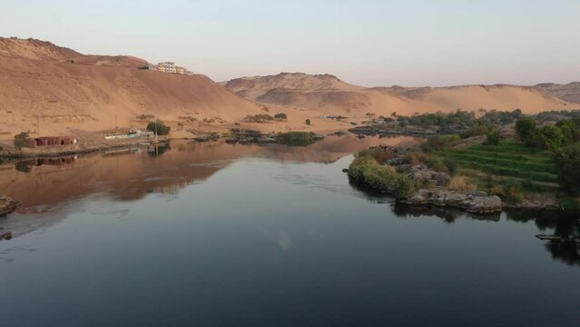 Aerial Drone Low FPV shot of Nile River and Islands in Aswan, Egypt.