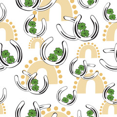 Seamless pattern metal horseshoes and leaf clover for good luck. lucky clover and horseshoe St.Patrick's Day. horseshoe clover Irish lucky green. vintage vector