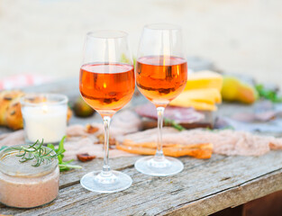 Beach picnic table with rose wine