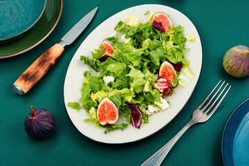 Homemade fruit salad bowl with figs.
