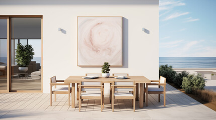 a coastal dining space with a wooden table set, framed abstract art on the wall