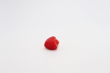 a raspberry on white background