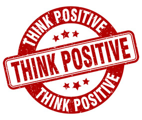 think positive stamp. think positive label. round grunge sign