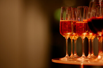 beautiful glasses of wine at an evening festive event