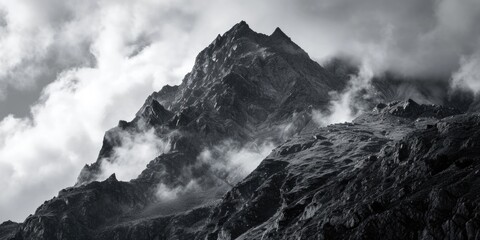 A stunning black and white photo capturing the beauty of a mountain. Perfect for nature enthusiasts...