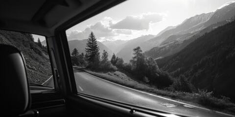 A scenic view of mountains seen through a car window. Ideal for travel and adventure themes - obrazy, fototapety, plakaty