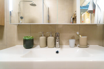 Faucets and sinks in modern bathrooms.