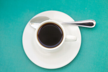 One cup of coffee on saucers