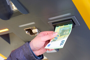 Closeup of cash machine. Pay with lots of money. Parking will be expensive in 2024.