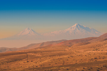 Wide angle view of sunrise over the Ararat mountains. Travel destination Armenia
