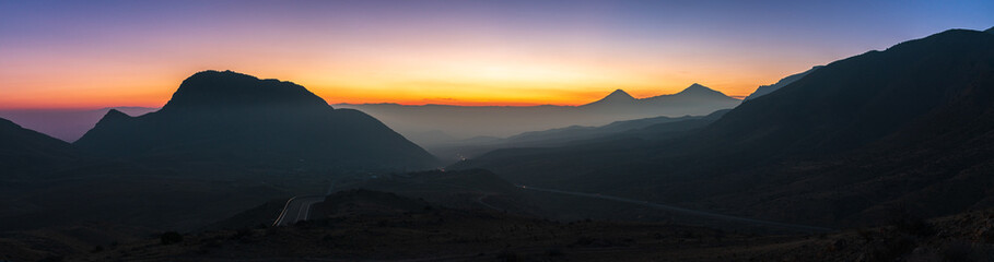 Colorful sunset over the Ararat mountains with mist over Ararat valley at winter. Travel destination Armenia