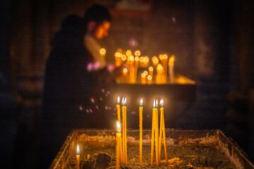 Burning candles in the church