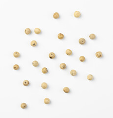 White peppercorn seeds isolated on a white background.