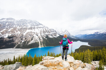 Young woman in Peyto lake, Banff National Park, Canada