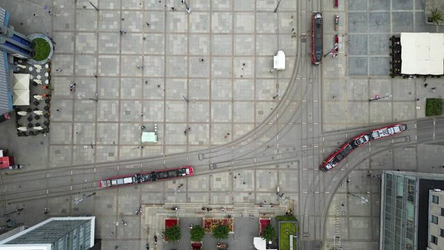 Top-down aerial shot of trams on Market Square in Katowice, Poland