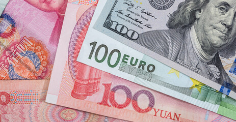 Close up of foreign currency banknotes as background. - Powered by Adobe