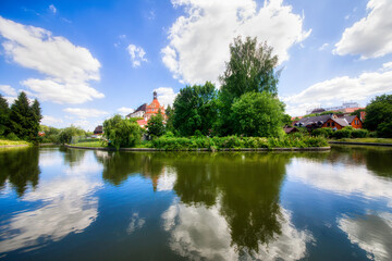 Fototapeta na wymiar The Nezarka River Floating through Jindrichuv Hradec in the Czech Republic, Passing the Famous Castle