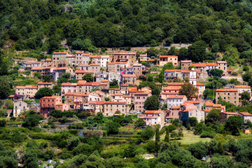 Fototapeta na wymiar The Village of Ota on Corsica Set in a Hillside in the Mountains Near the Gulf of Porto