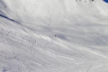Fotobehang Snowboarder on ski piste © BSANI