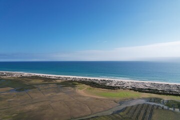 aerial drone view of climate in praia da fuseta in algarve portugal atlantic ocean and nature