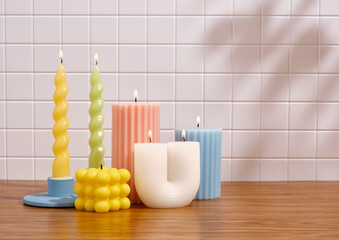 Burning candles and coziness. Interior accessories, romantic dinners. Copy space for text.