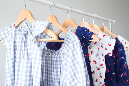 Variety of casual dresses on hangers
