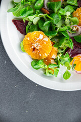 tangerine salad citrus, beets, green leaf lettuce, onion fresh delicious healthy eating meal food snack on the table copy space food